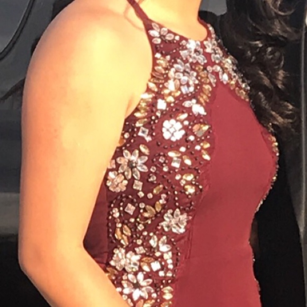 Maroon colored beaded special occasion dress